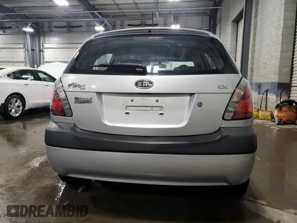 2009 Kia Rio LX with VIN KNADE243196496923, listed as a Copart auction lot 44235725 with 103,171 mi miles and Salvage Title. Bid and sale history available at carsss.com. Image 6.
