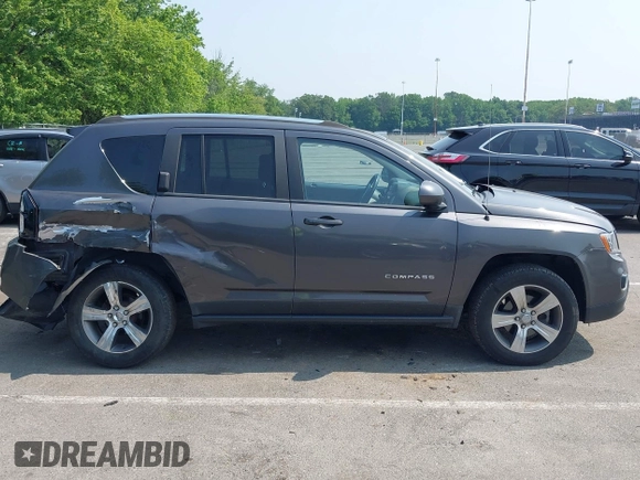 2017 Jeep Compass Latitude with VIN 1C4NJDEB4HD114026, listed as a IAAI auction lot 42449519 with 97,877 mi miles and . Bid and sale history available at DreamBid. Image 13.