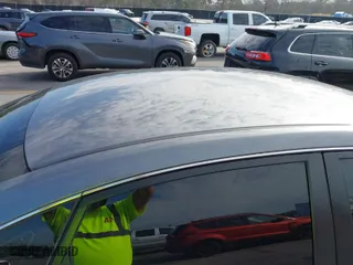 2015 Nissan Sentra SV with VIN 3N1AB7AP4FY353250, listed as a IAAI auction lot 41622285 with 141,228 mi miles. Bid and sale history available at carsss.com. Image 14.