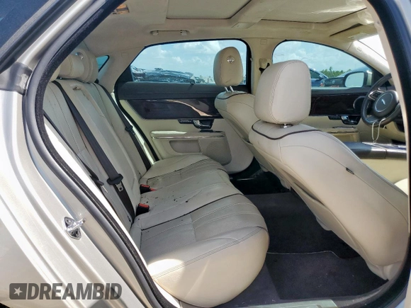 2013 Jaguar XJ Portfolio with VIN SAJWJ2GD5D8V49505, listed as a Copart auction lot 61171955 with 129,158 mi miles and Salvage title. Bid and sale history available at DreamBid. Image 10.