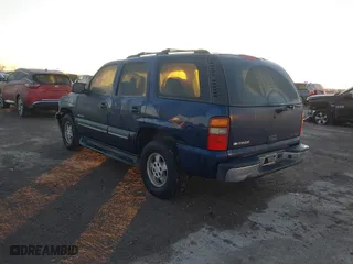 2003 Chevrolet Tahoe LS with VIN 1GNEC13V43R297842, listed as a IAAI auction lot 41653912 with 181,955 mi miles. Bid and sale history available at carsss.com. Image 3.