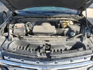 2023 Chevrolet Suburban Premier with VIN 1GNSCFKD5PR394675, listed as a Copart auction lot 49641395 with 56,946 mi miles and Salvage Title. Bid and sale history available at carsss.com. Image 12.