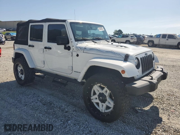 2015 Jeep Wrangler Unlimited Sahara with VIN 1C4BJWEG3FL584920, listed as a Copart auction lot 61843525 with 62,876 mi miles and Salvage title. Bid and sale history available at DreamBid. Image 4.