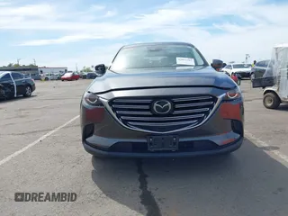 2021 Mazda CX-9 Sport with VIN JM3TCBBY7M0520437, listed as a IAAI auction lot 42022562 with 77,063 mi miles and . Bid and sale history available at DreamBid. Image 12.