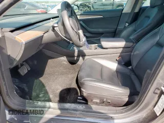 2021 Tesla Model 3 Standard Range Plus z VIN 5YJ3E1EA6MF082796, wystawiony jako Copart lot #53110955 z przebiegiem 92 009 mil mil oraz Szkoda całkowita • Salvage title. Historia ofert i sprzedaży dostępna na DreamBid. Obrazek 7.