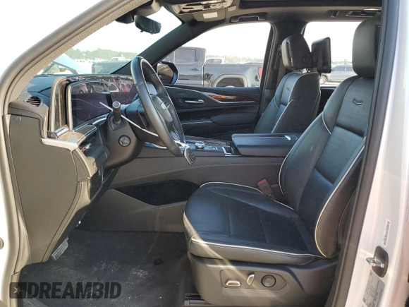 2023 Cadillac Escalade RWD Premium Luxury z VIN 1GYS3BKL5PR129533, wystawiony jako Copart lot #71565874 z przebiegiem 28 970 mil mil oraz Szkoda całkowita • Salvage title. Historia ofert i sprzedaży dostępna na DreamBid. Obrazek 7.