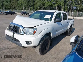 2015 Toyota Tacoma with VIN 3TMLU4EN5FM182720, listed as a IAAI auction lot 42555728 with 183,081 mi miles and . Bid and sale history available at DreamBid. Image 17.
