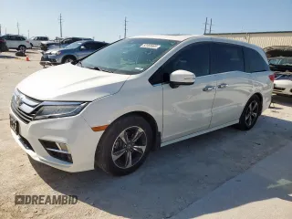 2018 Honda Odyssey Touring с VIN 5FNRL6H8XJB042111, выставлен на аукционе Copart как лот 52360005 с пробегом 126 835 миль миль и Чистый • Clean title. История ставок и продаж доступна на DreamBid. Изображение 1.