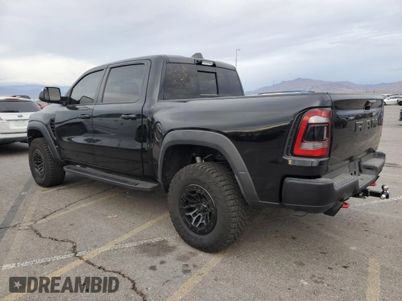 2024 Ram 1500 TRX with VIN 1C6SRFU94RN135421, listed as a Copart auction lot 82037944 with 6,969 mi miles and Salvage Title. Bid and sale history available at carsss.com. Image 2.