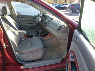2004 Toyota Camry LE with VIN 4T1BF32K04U074049, listed as a IAAI auction lot 41768724 with 262,296 mi miles and . Bid and sale history available at DreamBid. Image 5.
