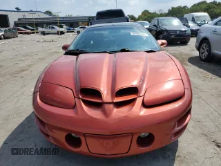 2002 Pontiac Firebird Formula z VIN 2G2FV22G822142457, wystawiony jako Copart lot #68560164 z przebiegiem 134 506 mil mil oraz Szkoda całkowita • Salvage title. Historia ofert i sprzedaży dostępna na DreamBid. Obrazek 5.