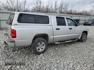 2007 Dodge Dakota SLT with VIN 1D7HW48P97S197684, listed as a Copart auction lot 86328944 with 122,969 mi miles and Salvage Title. Bid and sale history available at carsss.com. Image 3.