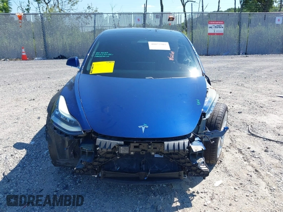 2019 Tesla Model 3 Mid Range with VIN 5YJ3E1EA6KF402308, listed as a IAAI auction lot 40077902 with 89,794 mi miles and . Bid and sale history available at carsss.com. Image 12.