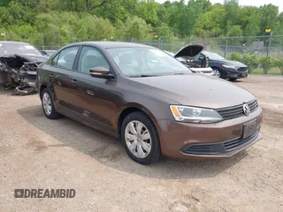 2014 Volkswagen Jetta SE with VIN 3VWD07AJ7EM251973, listed as a IAAI auction lot 42415573 with 124,323 mi miles and . Bid and sale history available at DreamBid. Image 1.