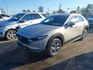 2024 Mazda CX-30 S Premium with VIN 3MVDMBDM9RM628162, listed as a IAAI auction lot 41262359 with 30,392 mi miles and . Bid and sale history available at DreamBid. Image 22.