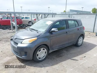 2010 Scion xD with VIN JTKKU4B42A1001367, listed as a IAAI auction lot 42085217 with 120,359 mi miles. Bid and sale history available at carsss.com. Image 2.