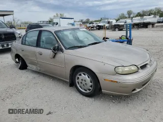 1999 Oldsmobile Cutlass GL z VIN 1G3NB52J8X6307474, wystawiony jako Copart lot #53060305 z przebiegiem 108 722 mil mil oraz Szkoda całkowita • Salvage title. Historia ofert i sprzedaży dostępna na DreamBid. Obrazek 4.