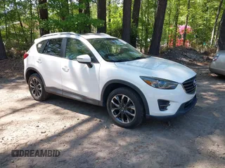 2016 Mazda CX-5 Grand Touring with VIN JM3KE2DY0G0870077, listed as a IAAI auction lot 42158225 with 93,816 mi miles. Bid and sale history available at carsss.com. Image 1.
