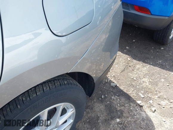 2023 Chevrolet Equinox LS z VIN 3GNAXSEG2PL166171, wystawiony jako IAAI lot #42378126 z przebiegiem 19 562 mil mil oraz . Historia ofert i sprzedaży dostępna na DreamBid. Obrazek 16.