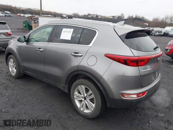 2017 Kia Sportage LX with VIN KNDPMCAC2H7238741, listed as a IAAI auction lot 41973333 with 64,714 mi miles and . Bid and sale history available at carsss.com. Image 3.