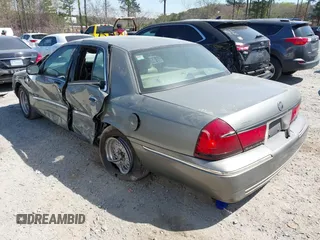 2001 Mercury Grand Marquis LS with VIN 2MEFM75W21X664449, listed as a IAAI auction lot 41898463 with 290,047 mi miles and . Bid and sale history available at DreamBid. Image 3.