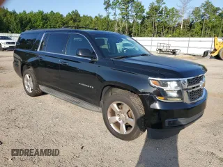 2015 Chevrolet Suburban LT with VIN 1GNSCJKC7FR163625, listed as a Copart auction lot 63949863 with 117,448 mi miles and . Bid and sale history available at DreamBid. Image 4.