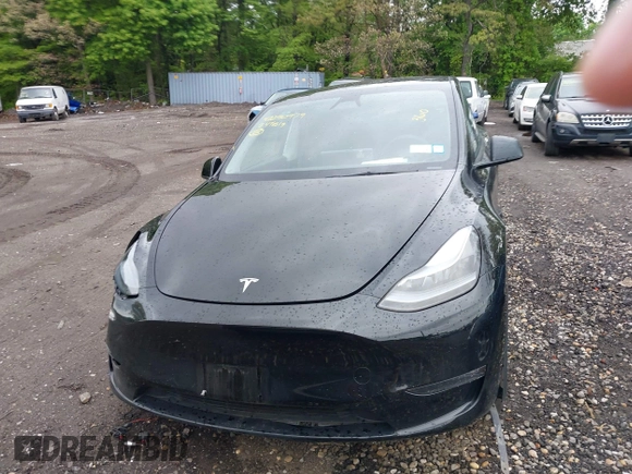 2024 Tesla Model Y Long Range z VIN 7SAYGDEE5RF130335, wystawiony jako IAAI lot #42250979 z przebiegiem 20 300 mil mil oraz . Historia ofert i sprzedaży dostępna na DreamBid. Obrazek 11.