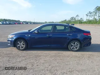 2017 Kia Optima LX with VIN 5XXGT4L35HG174613, listed as a IAAI auction lot 42097790 with 243,335 mi miles. Bid and sale history available at carsss.com. Image 14.