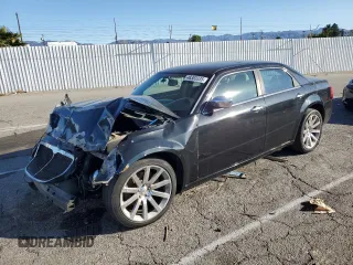 2006 Chrysler 300 C with VIN 2C3LA63H36H281427, listed as a Copart auction lot 46303335 with 92,924 mi miles and Salvage Title. Bid and sale history available at carsss.com. Image 1.