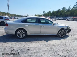 2017 Volkswagen Passat 1.8T SE w/Technology with VIN 1VWGT7A3XHC025096, listed as a IAAI auction lot 41891297 with 124,375 mi miles. Bid and sale history available at carsss.com. Image 13.