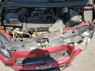 2012 Chevrolet Sonic LT with VIN 1G1JC6SH9C4133623, listed as a Copart auction lot 60065525 with 141,930 mi miles and Salvage title. Bid and sale history available at DreamBid. Image 11.