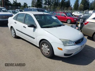 2006 Ford Focus S z VIN 1FAFP34N16W182218, wystawiony jako IAAI lot #41928282 z przebiegiem 163 799 mil mil oraz . Historia ofert i sprzedaży dostępna na DreamBid. Obrazek 1.