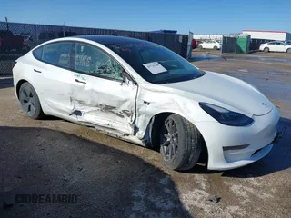 2021 Tesla Model 3 Long Range with VIN 5YJ3E1EB0MF992792, listed as a IAAI auction lot 41726740 with 33,507 mi miles. Bid and sale history available at carsss.com. Image 1.