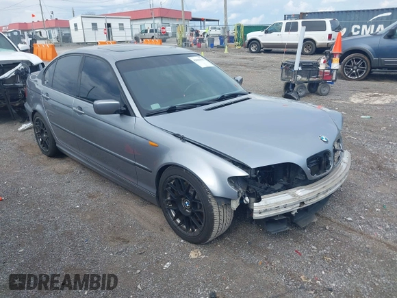 2003 BMW 3 Series 330i with VIN WBAEV53463KM04252, listed as a IAAI auction lot 42006945 with 193,387 mi miles. Bid and sale history available at carsss.com. Image 1.