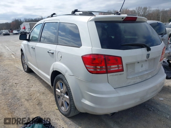 2009 Dodge Journey R/T with VIN 3D4GH67V99T169786, listed as a IAAI auction lot 41708329 with 131,556 mi miles and . Bid and sale history available at DreamBid. Image 3.