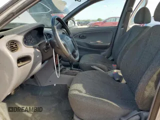 1999 Hyundai Elantra z VIN KMHJF25F1XU777099, wystawiony jako Copart lot #58870035 z przebiegiem 69 470 mil mil oraz Czysty tytuł • Clean title. Historia ofert i sprzedaży dostępna na DreamBid. Obrazek 7.