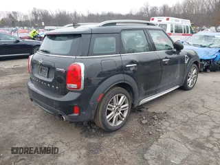 2019 MINI Countryman Cooper S with VIN WMZYT5C58K3J87679, listed as a IAAI auction lot 41711500 with 74,433 mi miles. Bid and sale history available at carsss.com. Image 4.