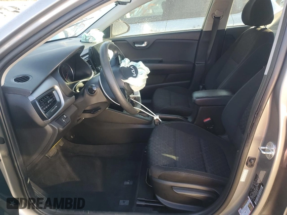 2022 Kia Rio LX with VIN 3KPA24AD4NE464172, listed as a Copart auction lot 87828245 with 63,796 mi miles and Salvage Title. Bid and sale history available at carsss.com. Image 7.