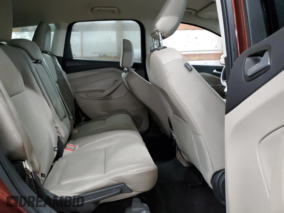 2018 Ford Escape SE z VIN 1FMCU9GD2JUA21582, wystawiony jako Copart lot #56165155 z przebiegiem 88 881 mil mil oraz Czysty tytuł • Clean title. Historia ofert i sprzedaży dostępna na DreamBid. Obrazek 10.