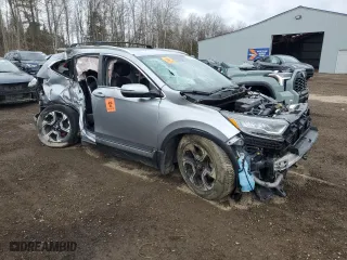 2017 Honda CR-V Touring with VIN 2HKRW2H91HH120151, listed as a Copart auction lot 48673665 with 0 mi miles and Salvage Title. Bid and sale history available at carsss.com. Image 4.