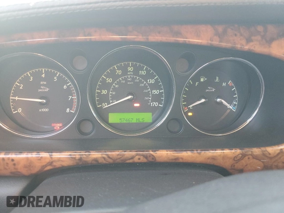 2005 Jaguar XJ Vanden Plas z VIN SAJWA82C75SG45094, wystawiony jako Copart lot #83891564 z przebiegiem 57 467 mil mil oraz Szkoda całkowita • Salvage title. Historia ofert i sprzedaży dostępna na DreamBid. Obrazek 9.