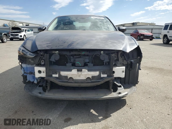 2020 Mazda 6 Sport with VIN JM1GL1UM9L1517935, listed as a Copart auction lot 46538025 with 55,890 mi miles and Salvage Title. Bid and sale history available at DreamBid. Image 5.