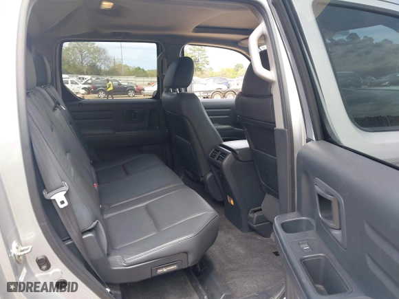 2014 Honda Ridgeline SE with VIN 5FPYK1F62EB013329, listed as a IAAI auction lot 41876728 with 127,014 mi miles. Bid and sale history available at carsss.com. Image 8.