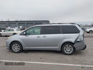 2011 Toyota Sienna XLE AAS with VIN 5TDYK3DC5BS150527, listed as a IAAI auction lot 41143189 with 147,551 mi miles and . Bid and sale history available at DreamBid. Image 14.