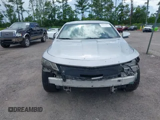 2017 Chevrolet Impala LT with VIN 2G1105SA0H9159893, listed as a IAAI auction lot 39953475 with 136,212 mi miles and . Bid and sale history available at DreamBid. Image 12.