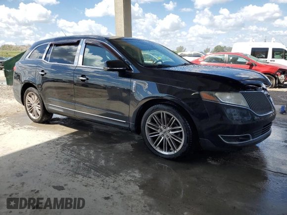 2014 Lincoln MKT EcoBoost with VIN 2LMHJ5AT7EBL50642, listed as a Copart auction lot 50880735 with 166,966 mi miles and Clean Title. Bid and sale history available at DreamBid. Image 4.