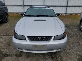 1999 Ford Mustang GT with VIN 1FAFP45X0XF234431, listed as a Copart auction lot 47402055 with 105,861 mi miles and Salvage title. Bid and sale history available at DreamBid. Image 5.