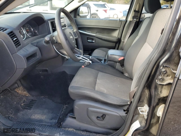 2010 Jeep Grand Cherokee Laredo with VIN 1J4PS4GK7AC117852, listed as a Copart auction lot 89107185 with 167,357 mi miles and Salvage Title. Bid and sale history available at carsss.com. Image 7.