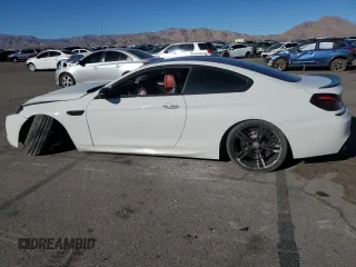 2015 BMW M6 z VIN WBSLX9C54FD160753, wystawiony jako Copart lot #83486484 z przebiegiem 80 275 mil mil oraz Szkody całkowita. Historia ofert i sprzedaży dostępna na DreamBid. Obrazek 2.
