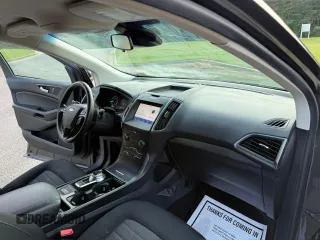 2020 Ford Edge SE с VIN 2FMPK3G9XLBB11099, выставлен на аукционе Copart как лот 66417805 с пробегом 119 223 миль миль и Чистый • Clean title. История ставок и продаж доступна на DreamBid. Изображение 9.